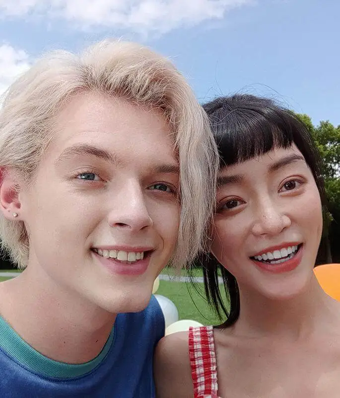 A girl and a boy's selfie without using panorama mode on Redmi 10