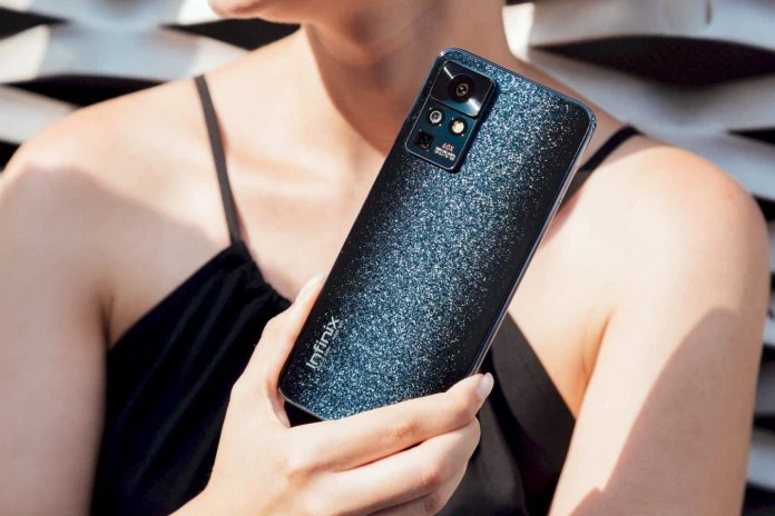 Infinix ZERO X phone holded by a girl in black top