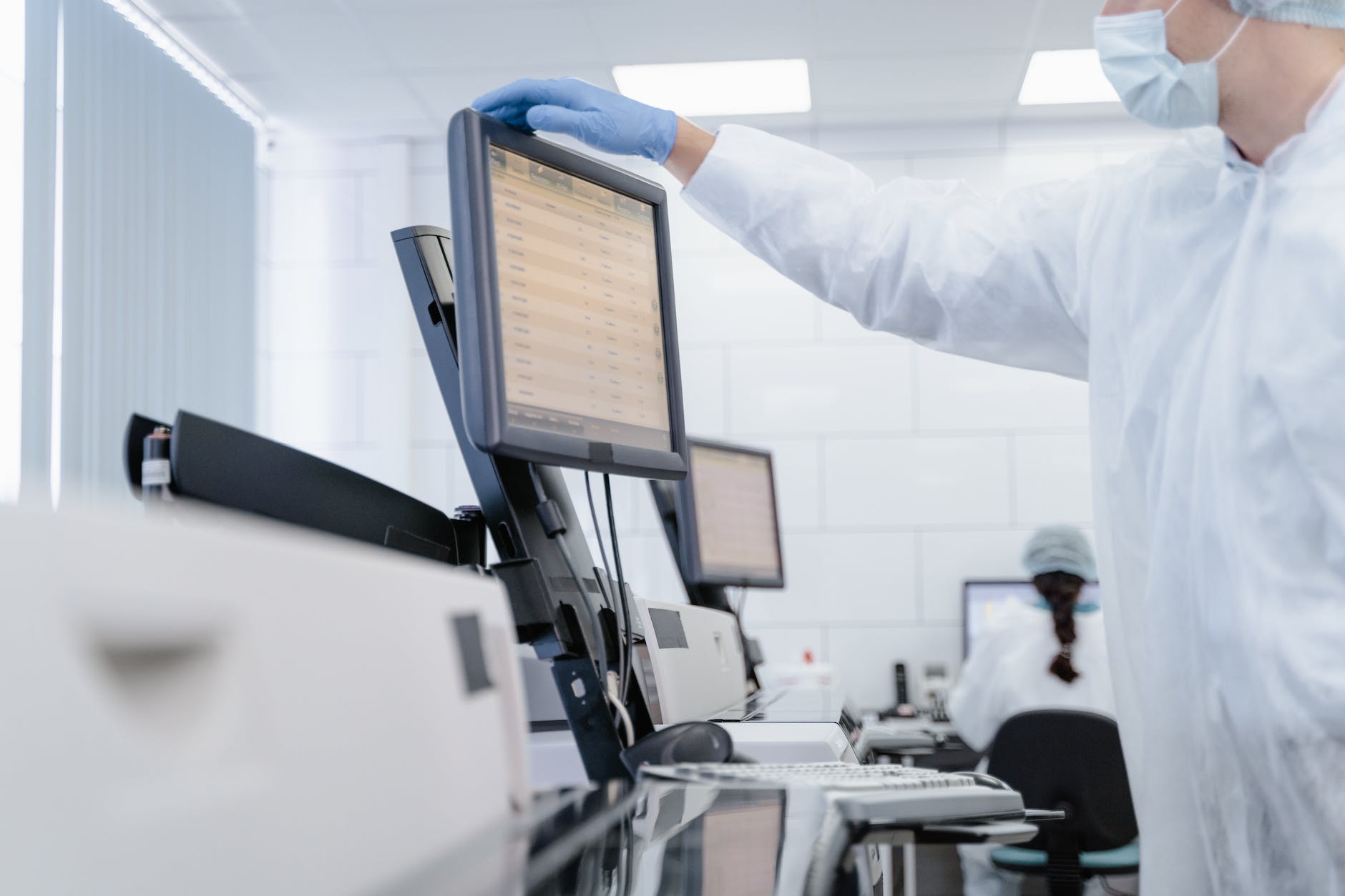 scientist looking at a screen Healthcare Tech