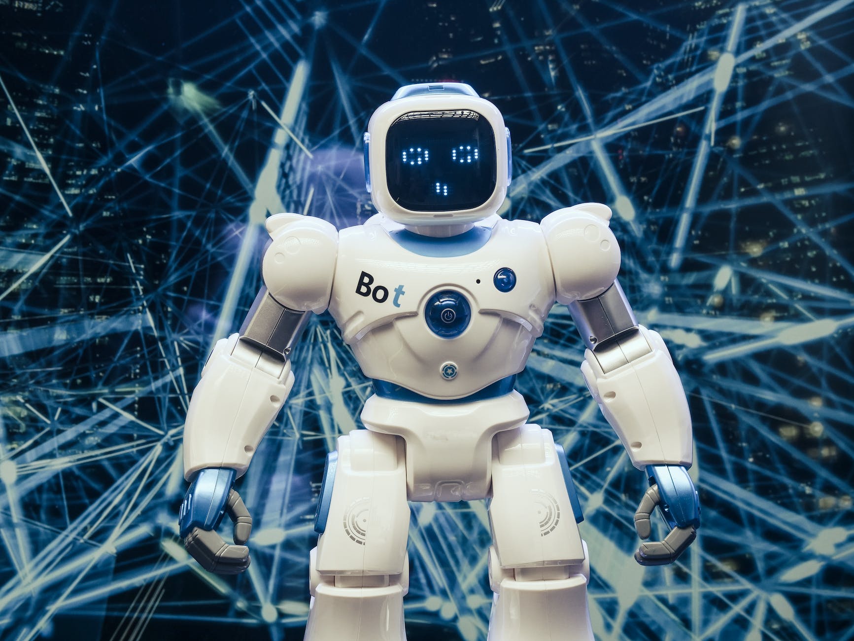 white and blue AI robot figure