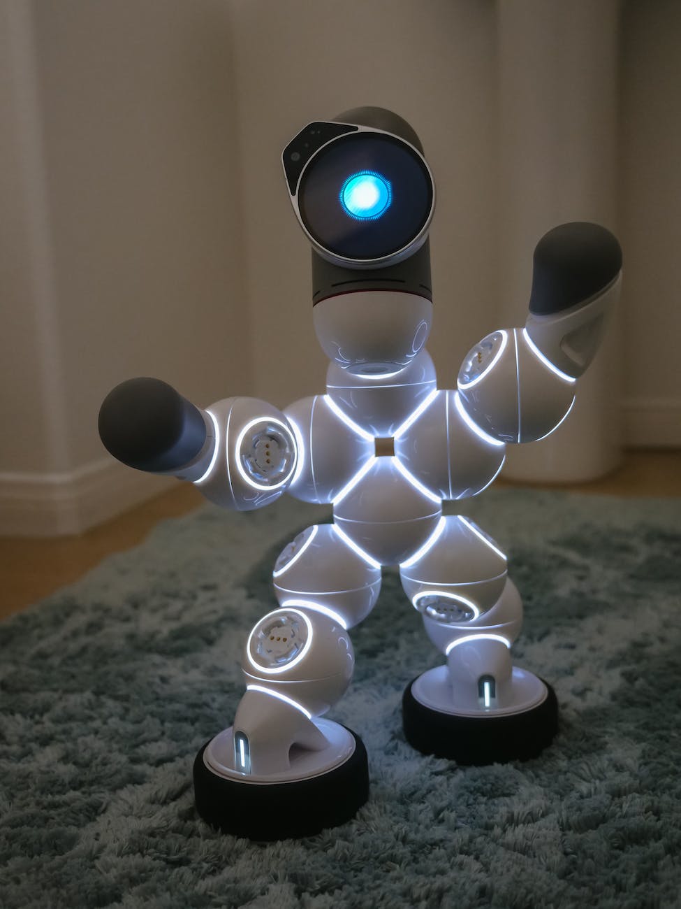 a clicbot dancing on the carpet